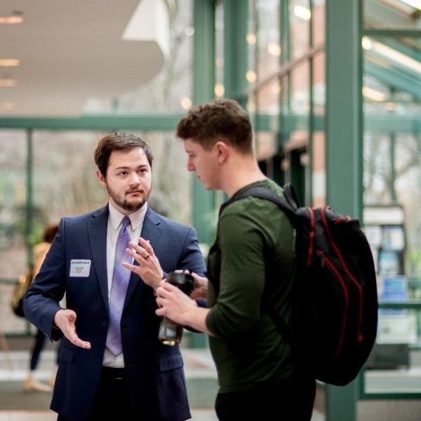 Student Scholars Day participants discuss research